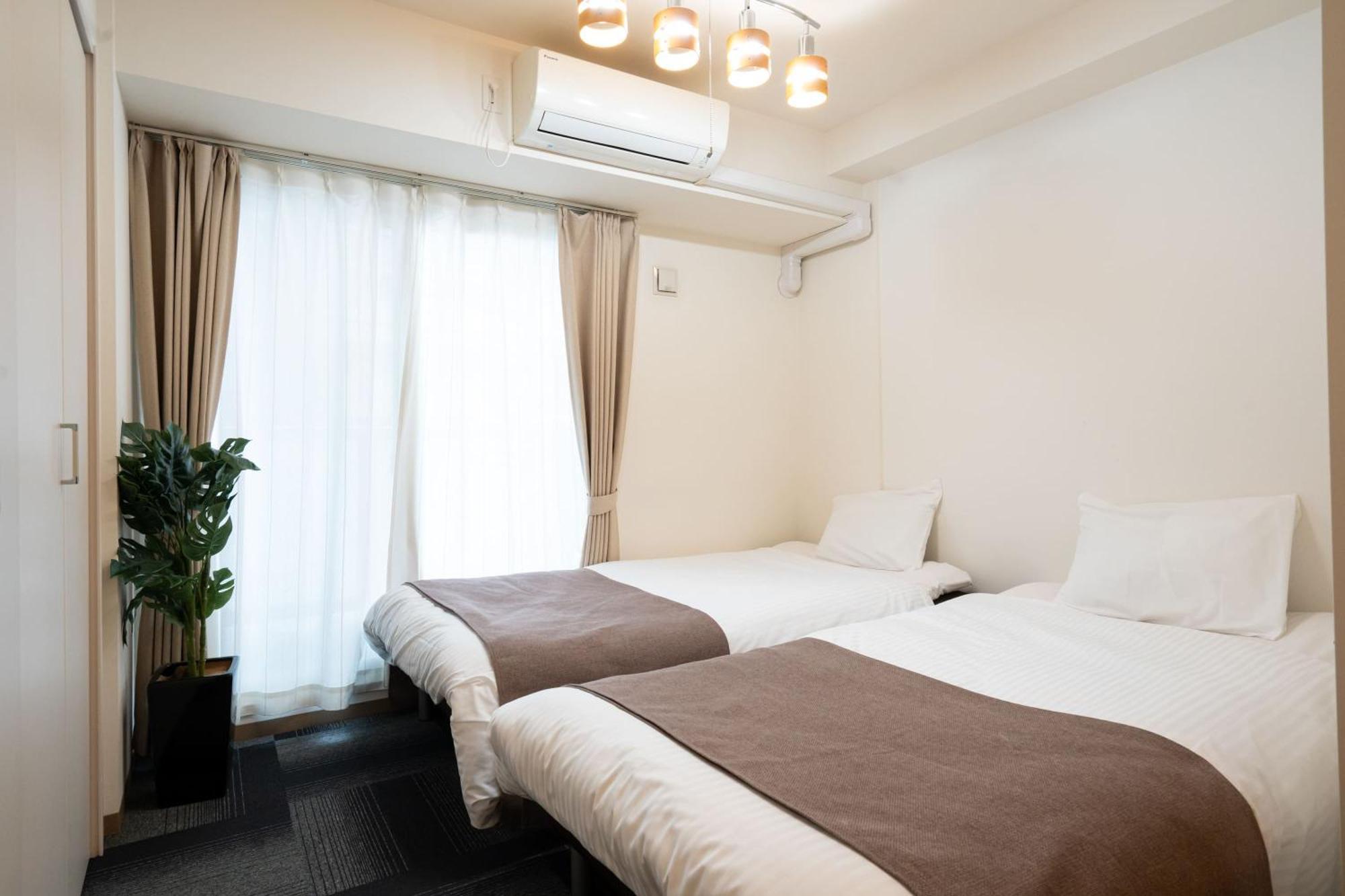 Appartement Tsubaki Garden à Sapporo Chambre photo